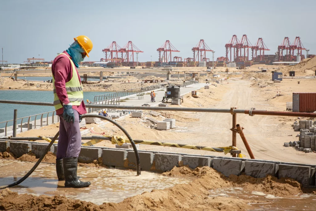 A worker at the construction site of Port City Colombo, a node in China’s global trade infrastructure network.